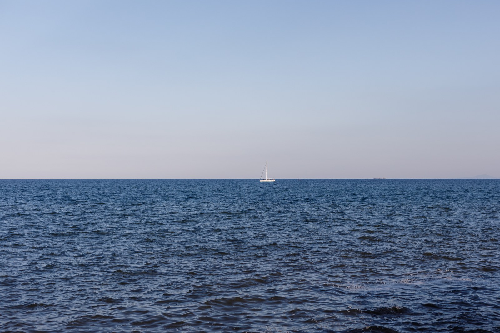 Sailboat on the horizon